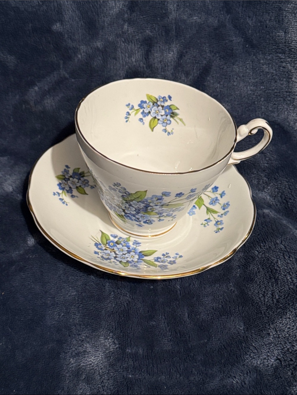 Vintage White Teacup and Saucer with Blue Floral Pattern